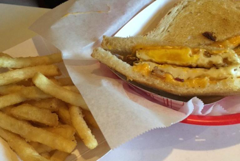 clocked-grilled-cheese-bacon-egg-sandwich-fries-credit-visitathensga