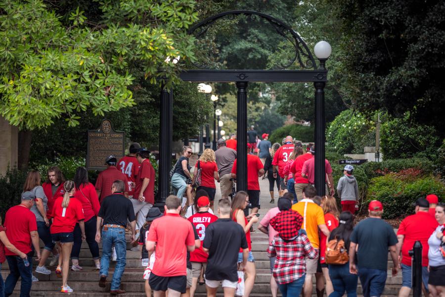 people walking around The Arch at UGA